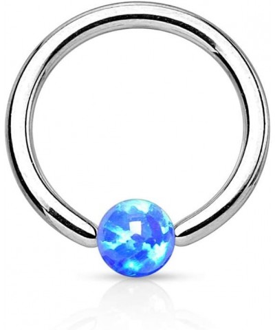 SYNTHETIC OPAL BALL 316L SURGICAL STEEL CAPTIVE BEAD RING (SOLD PER PIECE) Length: 5/16" (8mm) Opal Blue $10.61 Body Jewelry